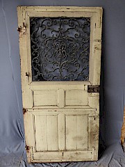 Eichehaustür mit großem, gusseisernen Gitter DIN li, ca. 94 x 191 cm